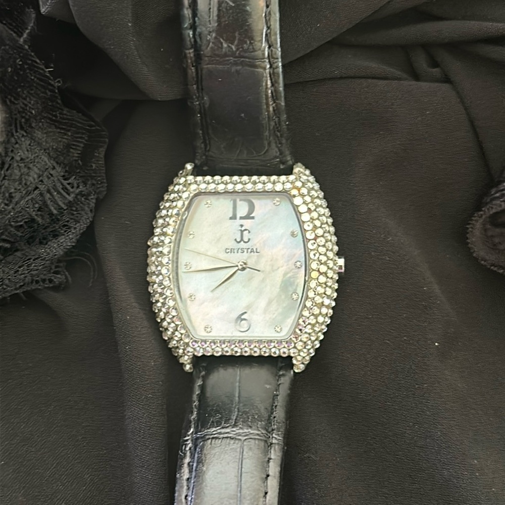 Jc Crystal Bezel Black Genuine Leather strap.